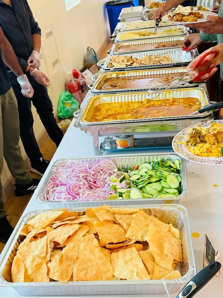 Vibrant buffet setup with Bengali street food and delicacies at an event